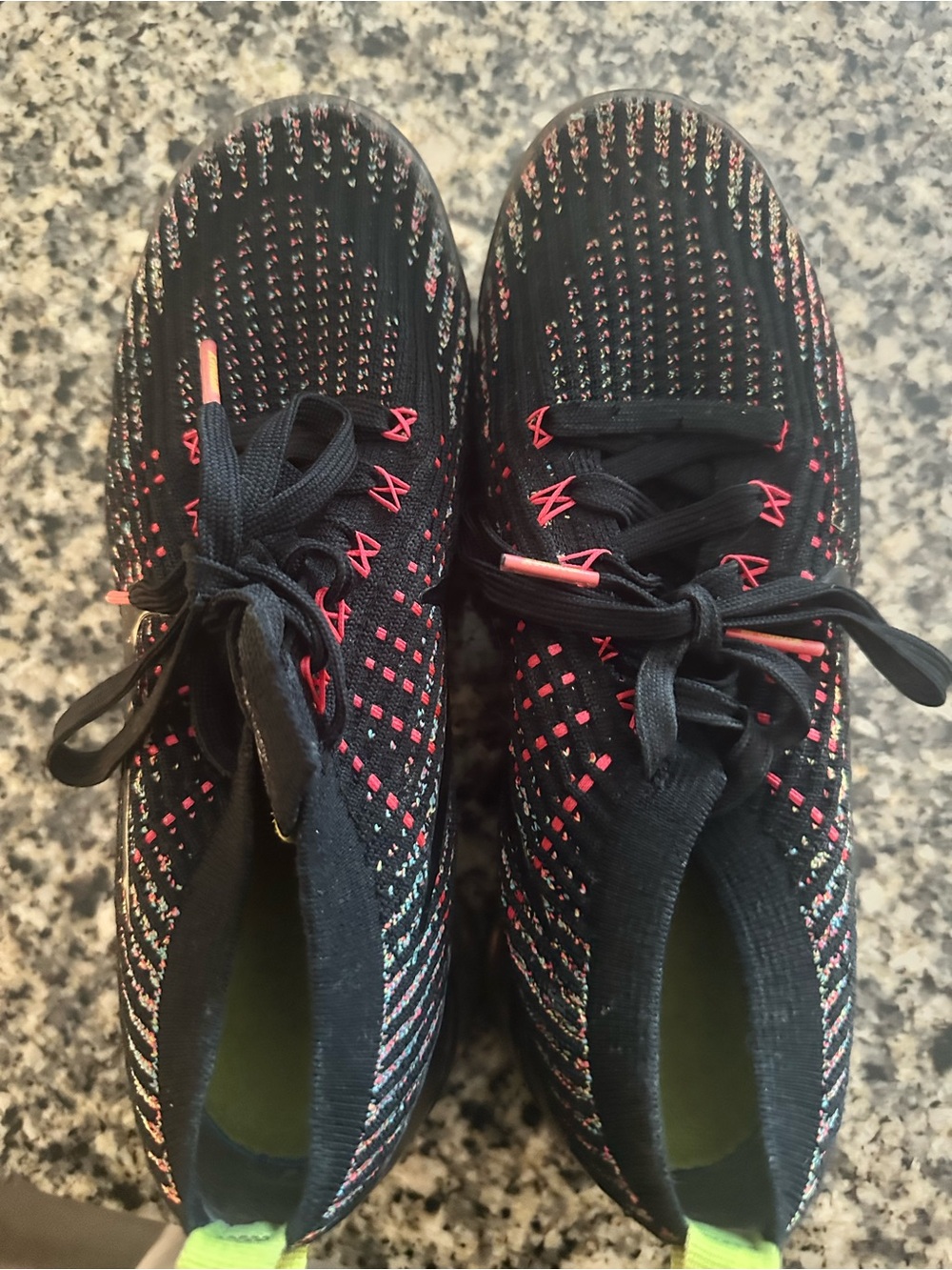 Nike Women’s Black Knit Running Sneakers with Pink Accents